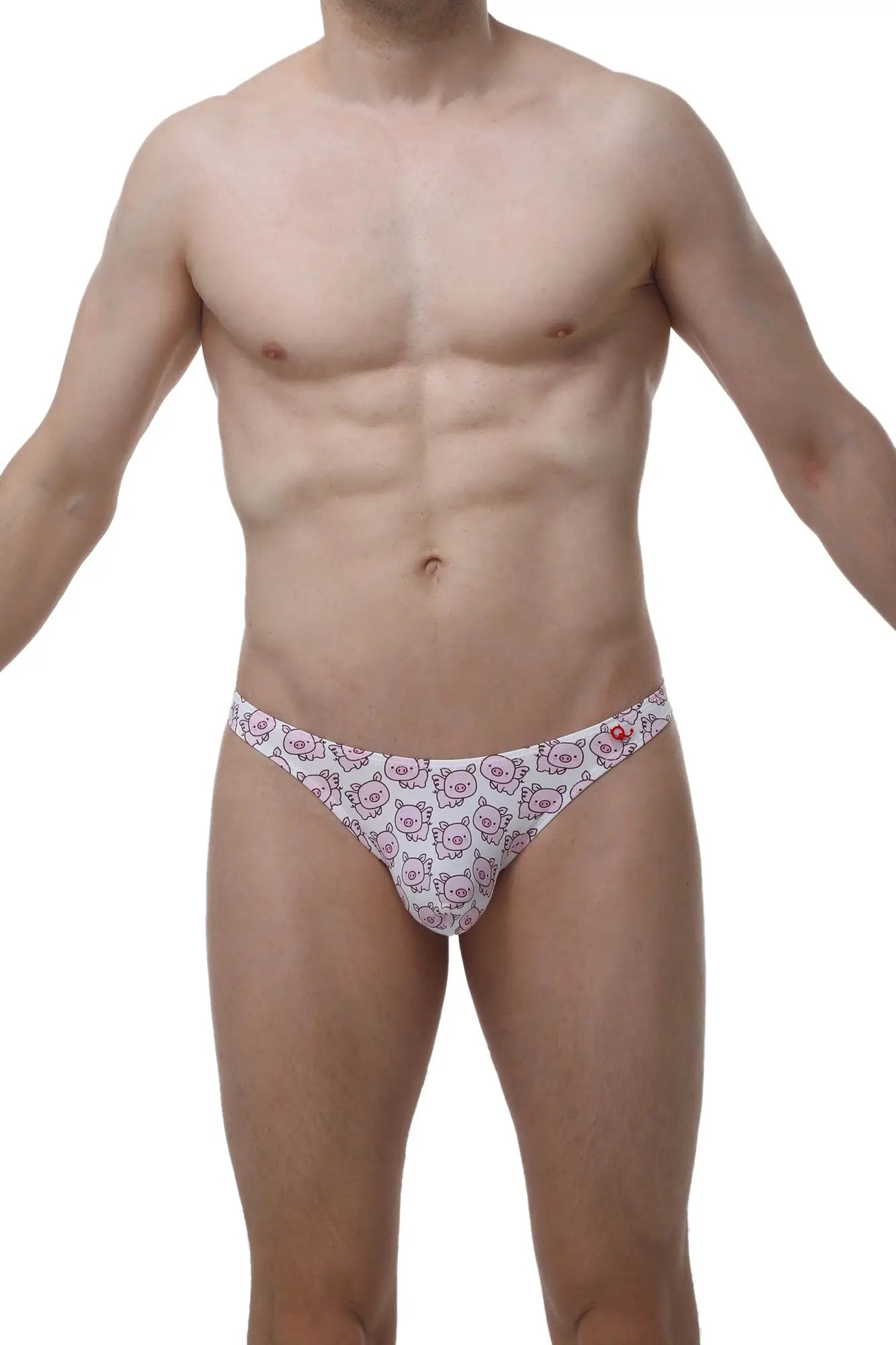 White briefs with a repeating pattern of pink cartoon pig faces from petitq thong chill piggy love collection