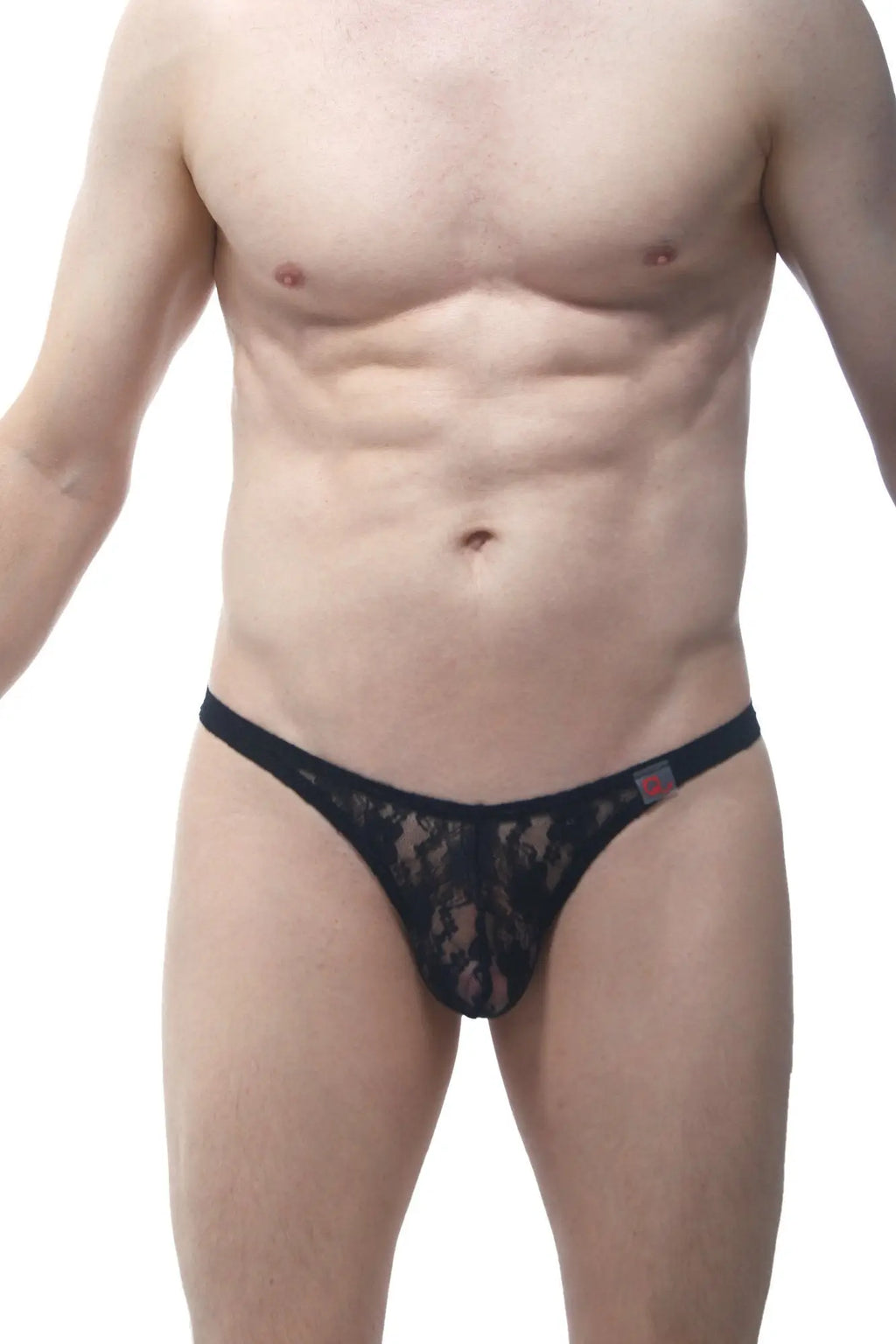 PetitQ thong lace black featuring a delicate intricate black lace pattern and a small red logo on the waistband
