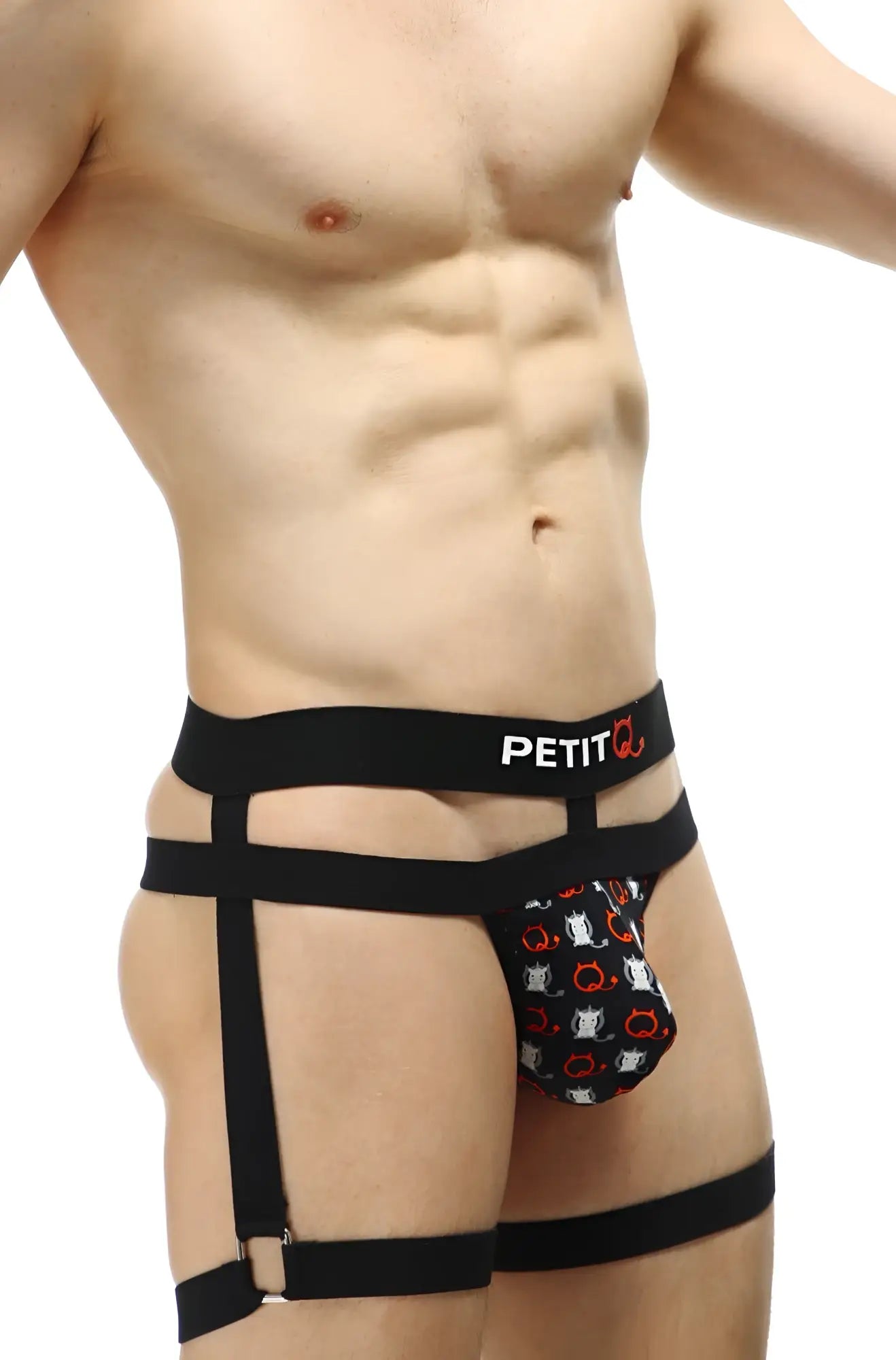 Black harness-style briefs with red and white cat face pattern on pouch and petitq branding in white lettering