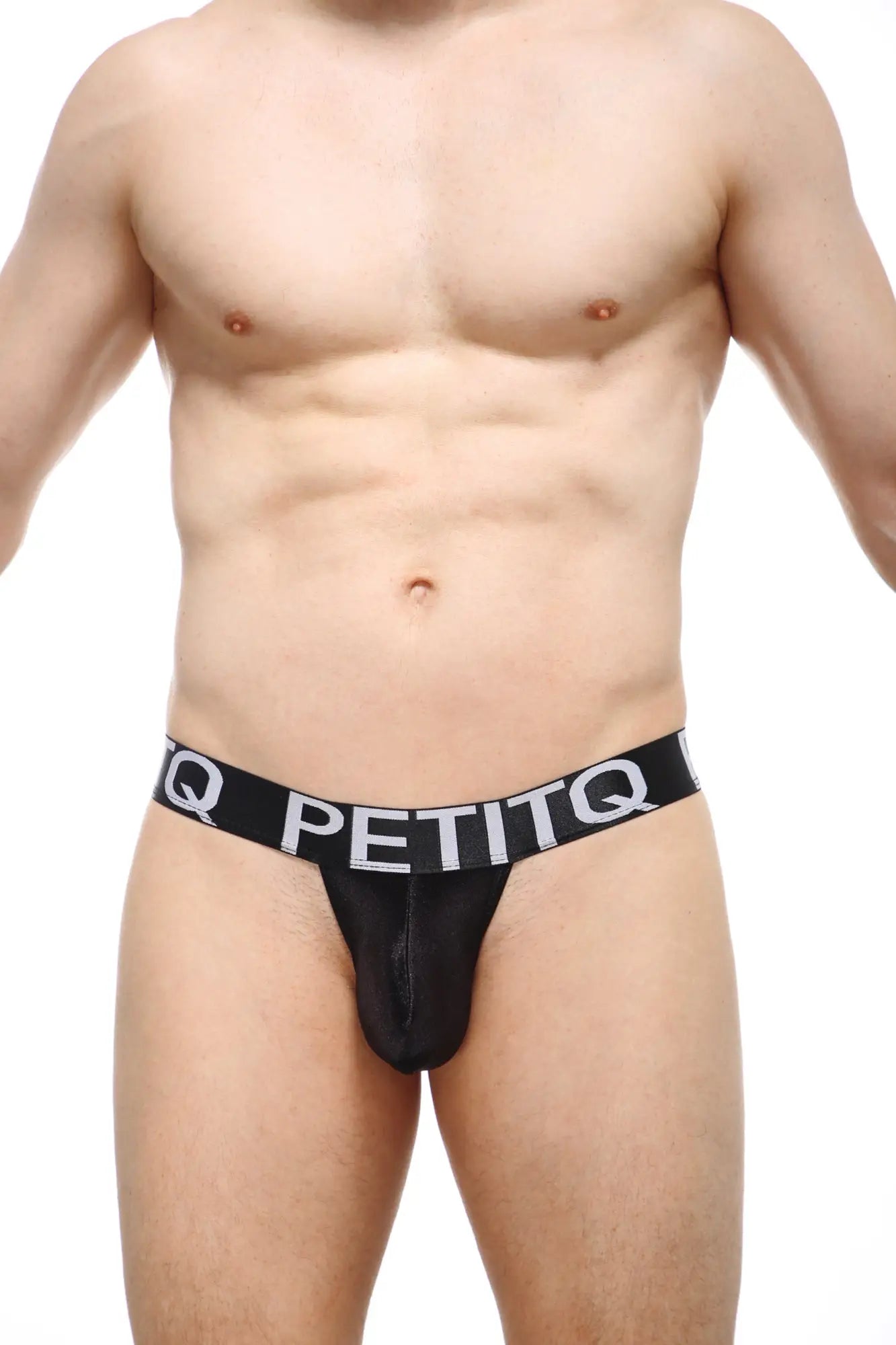 Black petitq satin thong migny with wide waistband featuring white lettering showcasing back side view