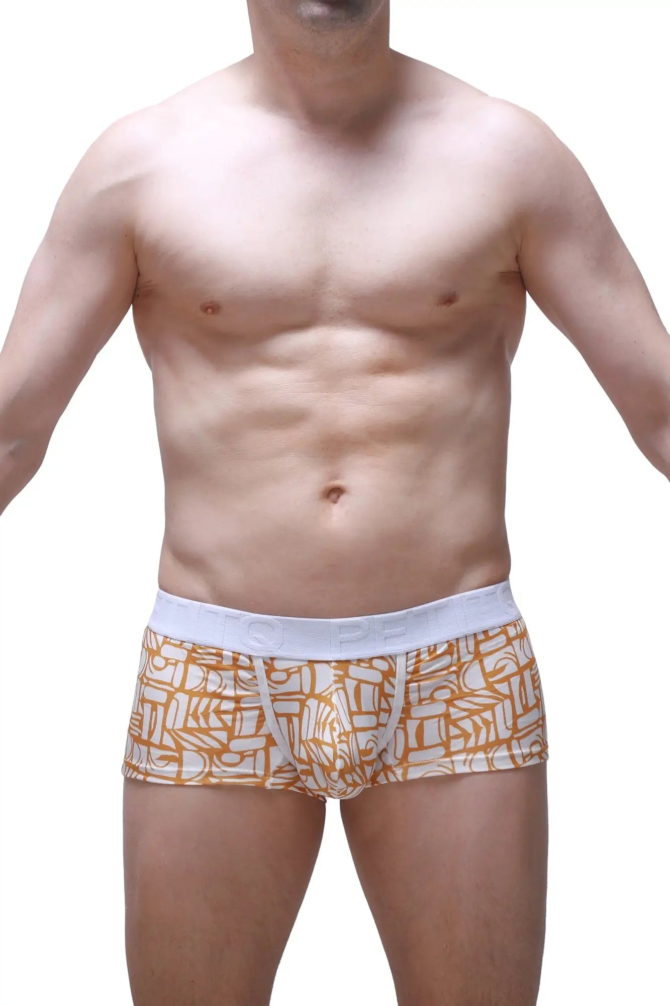 Orange and white patterned men’s boxer briefs with a solid white waistband from petitq trunk carlot alloy collection