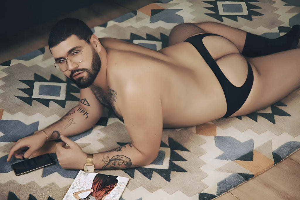 Black cut-out bikini bottom with sleek form-fitting design from pikante pik 0979x angola jockstrap collection