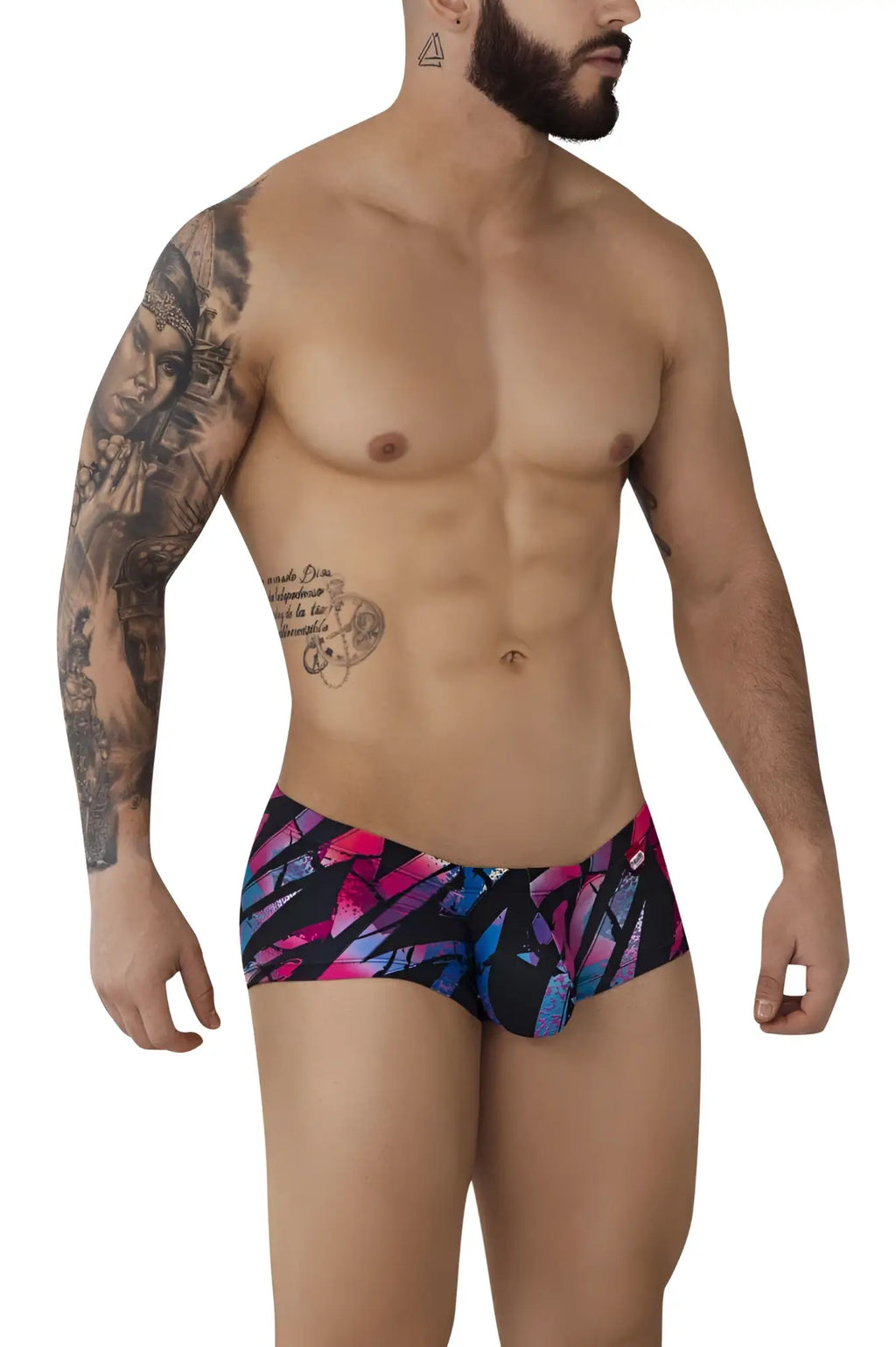 Vibrant abstract patterned pikante pik 0988 jartum swim trunks in bold pink and blue hues on black background