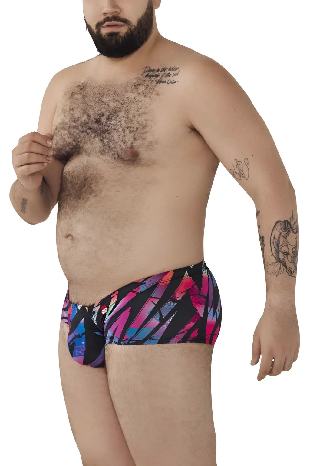Vibrant geometric patterned pikante pik 0988x jartum trunks in bold pink blue and purple hues on black background