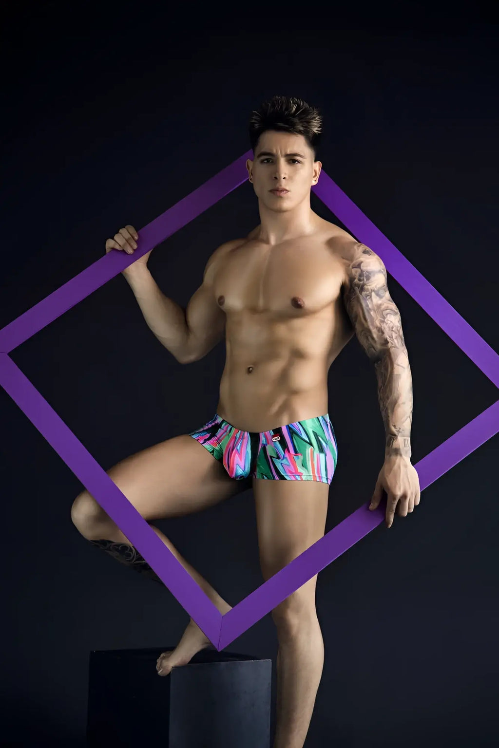 Vibrant pikante PIK 1828 abstract trunks in neon pink turquoise and green with tropical pattern for swimming