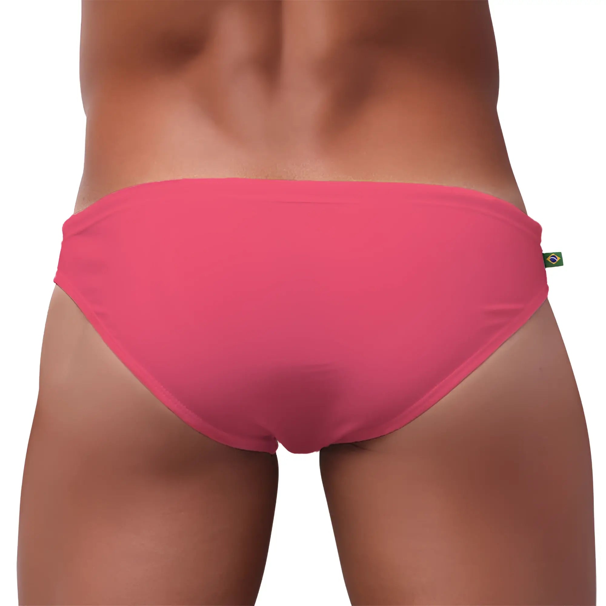 Bright pink form-fitting men’s swimming sunga with small brazilian flag tag perfect for beachwear