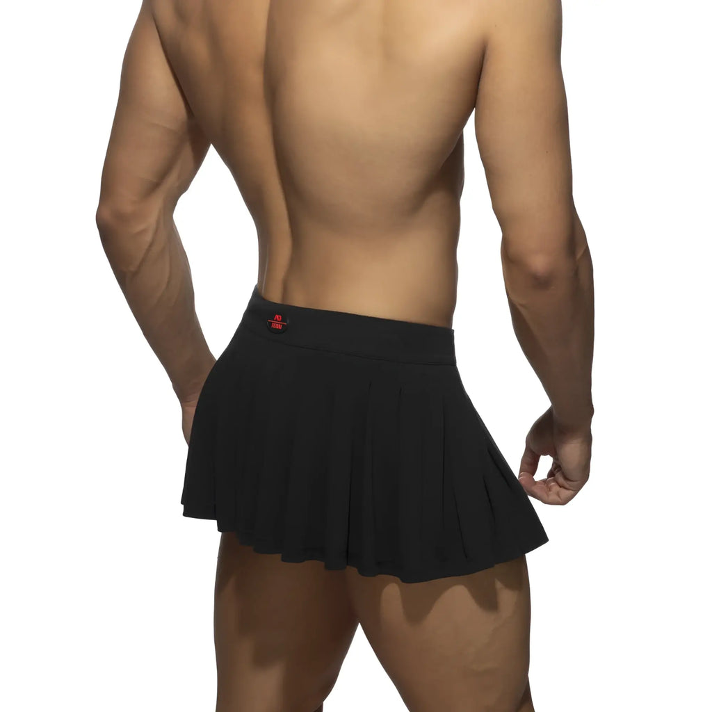 Black pleated ring skirt featuring a red logo on the waistband for stylish casual wear