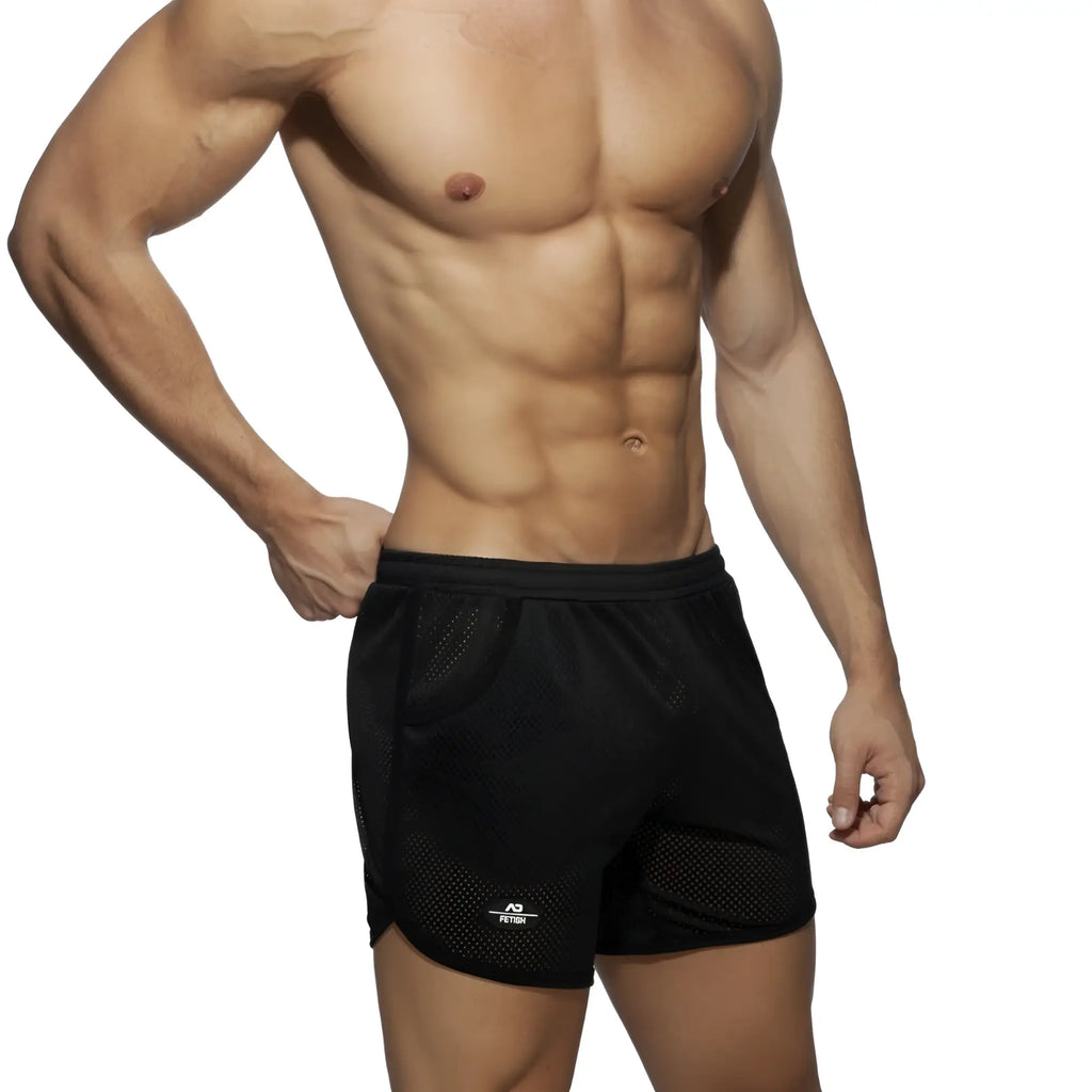 Black mesh pocket long mesh rocky athletic shorts with subtle logo on the lower left leg