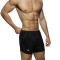 Black mesh pocket long mesh rocky athletic shorts with subtle logo on the lower left leg