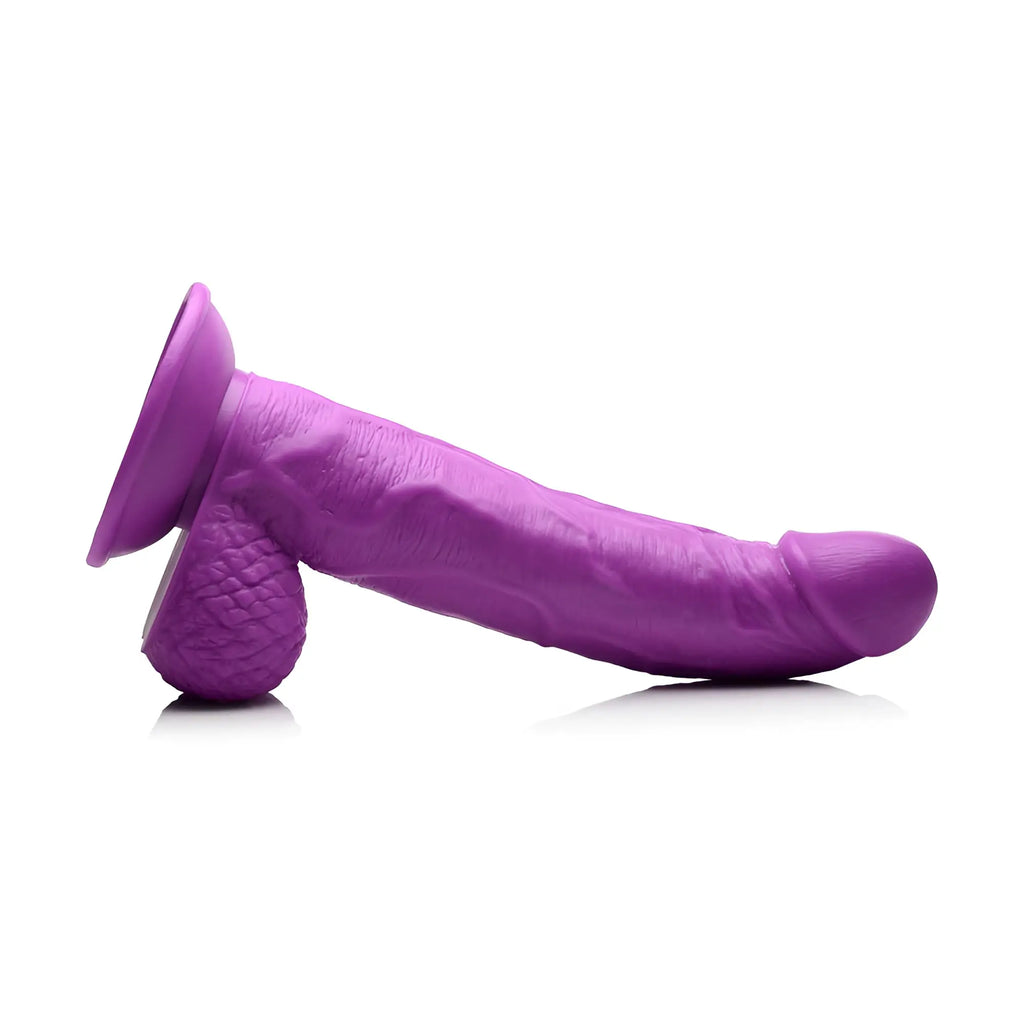 Pop Peckers 7.5-inch curved purple dildo with realistic texture and base, shown against a white background.
