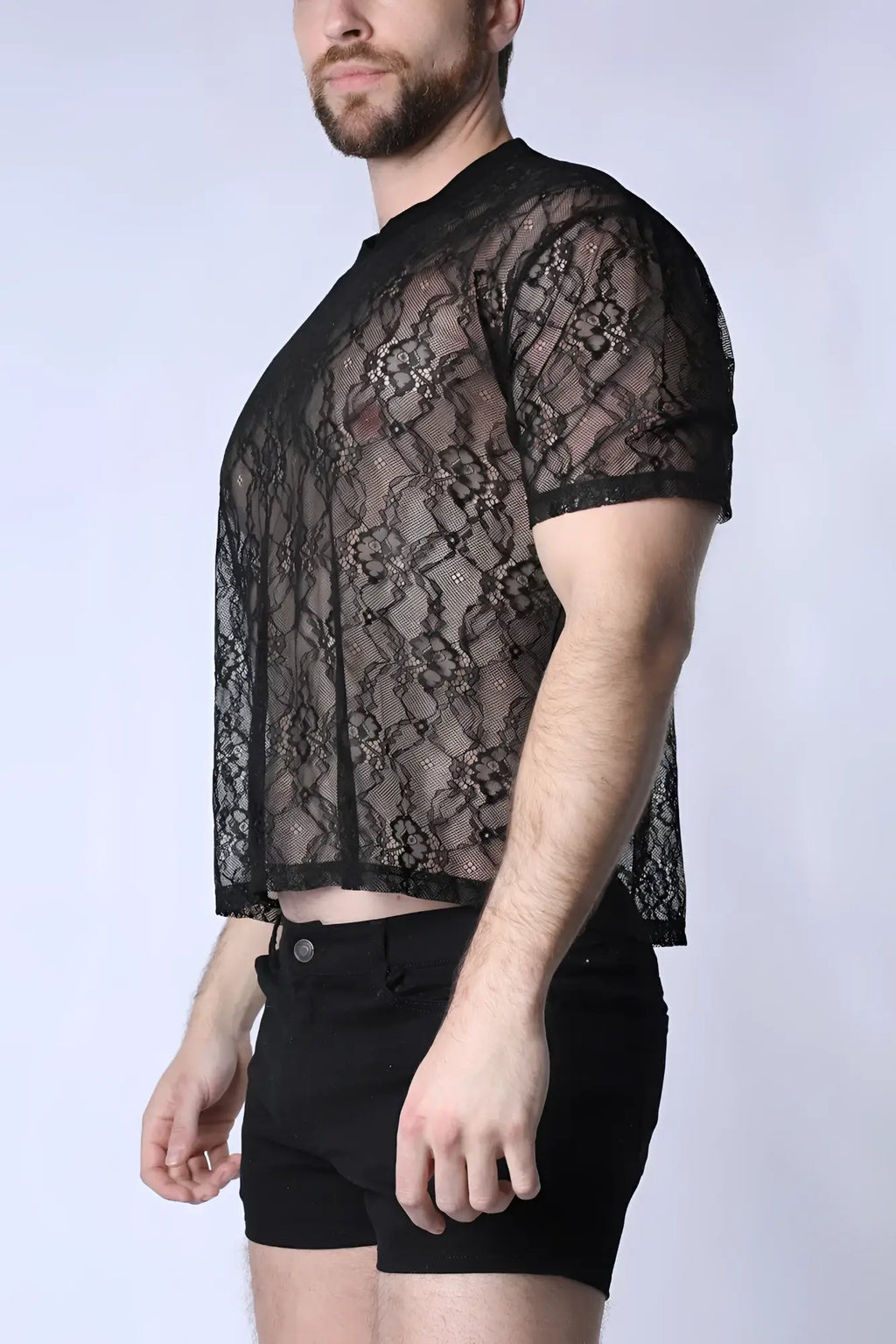 Black lace short-sleeved cropped t-shirt with floral pattern and subtle glitter accents in positano style