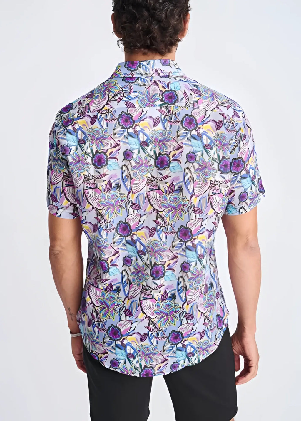 Floral lightweight linen tencel short sleeve shirt with dense purple blue and pink floral pattern on light background