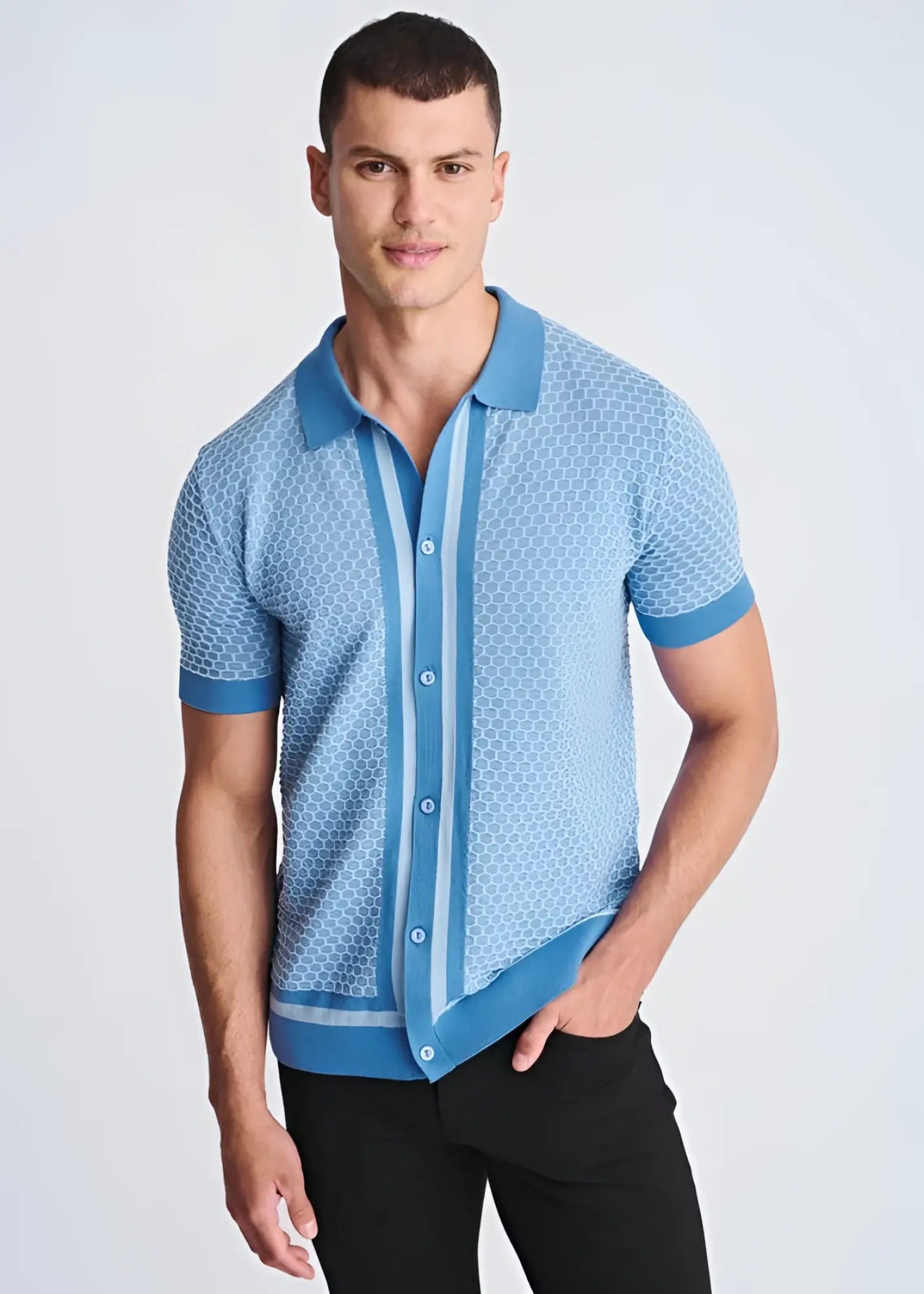 Light blue short-sleeved knit polo shirt with honeycomb texture and darker blue trim on collar placket cuffs and hem