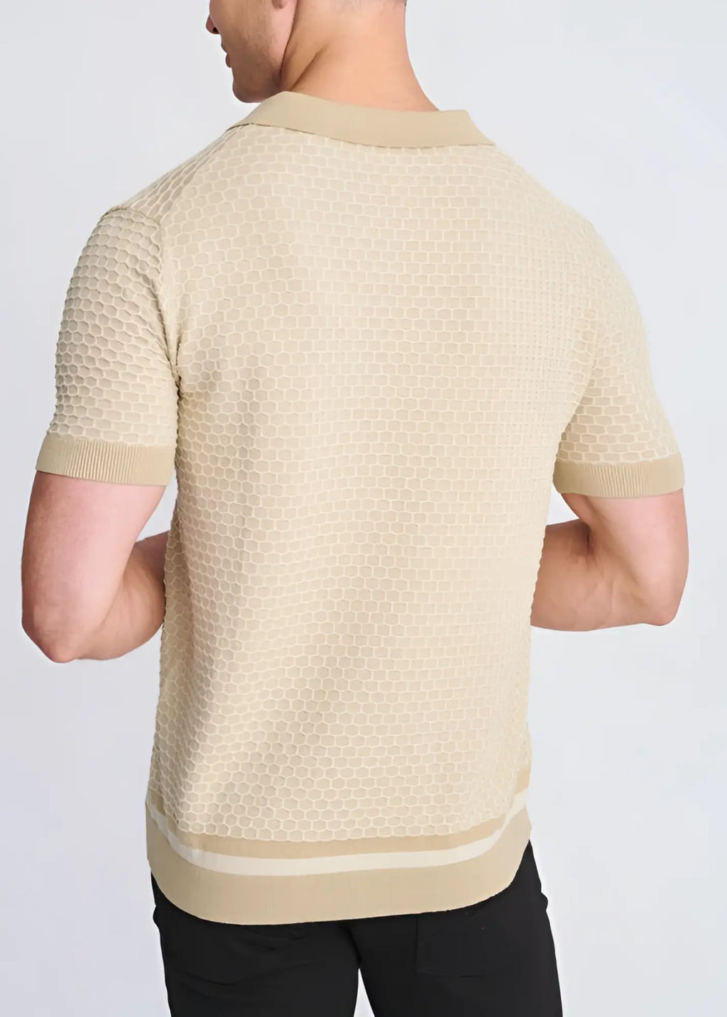 Beige short-sleeved polo shirt with honeycomb textured knit and ribbed collar cuffs and hem in knit fabric