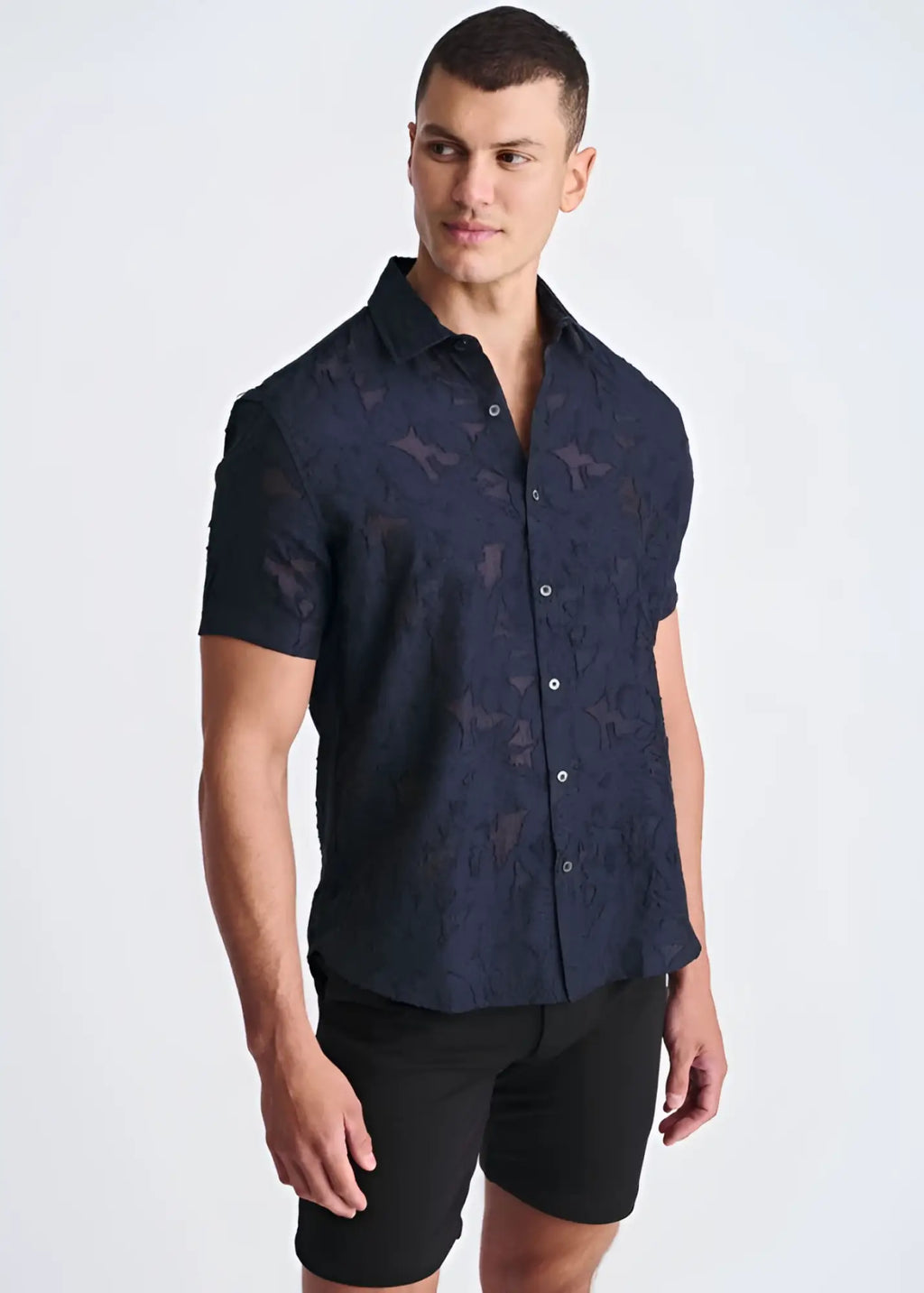 Dark navy lightweight jacquard short-sleeved button-up shirt with a subtle textured star pattern