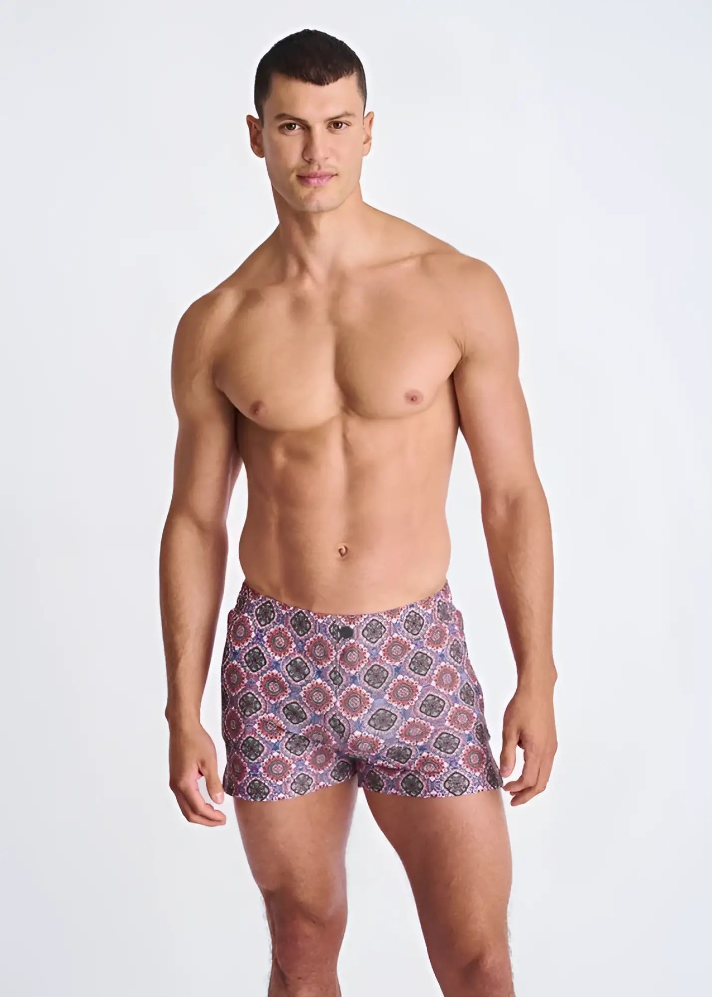 Medallions seersucker swim shorts with mesh lining featuring vibrant purple red and blue geometric patterns