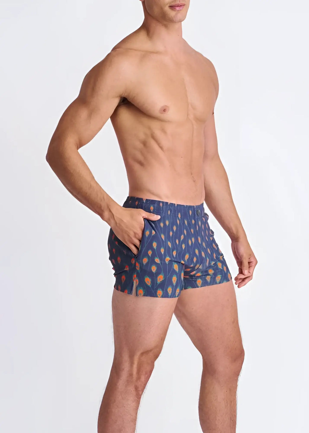 Peacock feathers seersucker swim shorts in blue with orange and yellow leaf motifs featuring mesh lining
