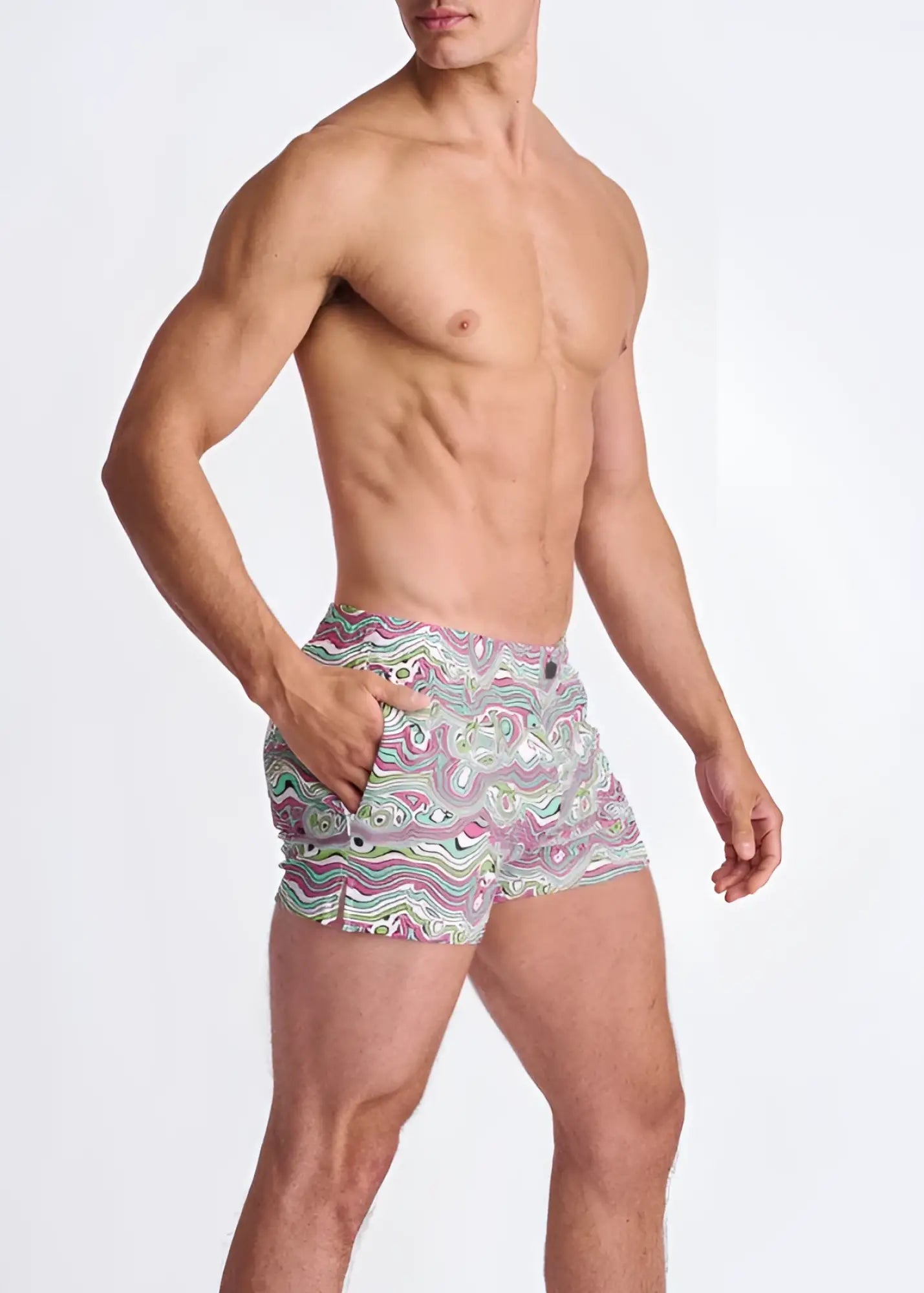Men’s swirls print seersucker swim shorts with mesh lining featuring vibrant pink green and white swirling pattern