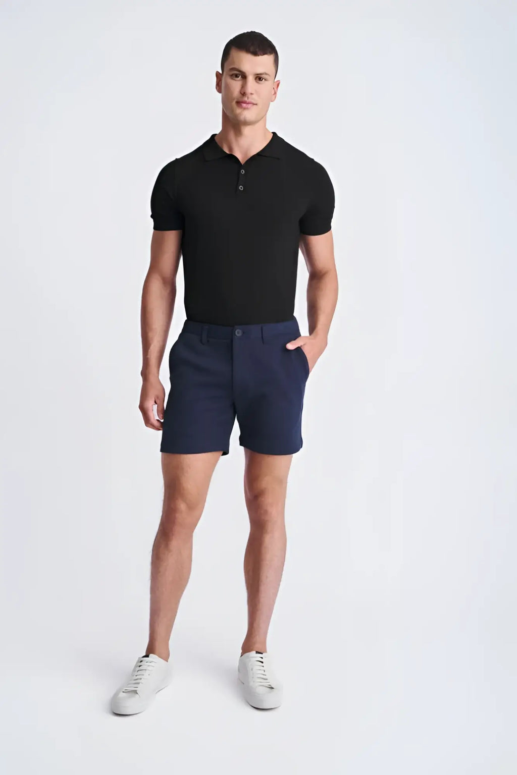 Navy blue textured stretch knit chino shorts with classic fit and button closure for comfortable casual wear