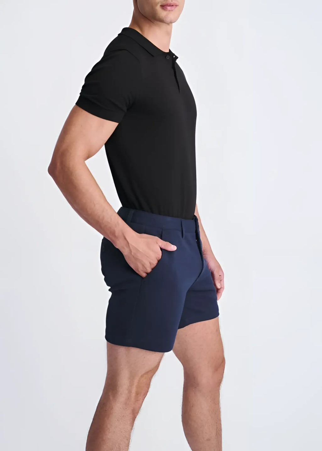 Navy blue textured stretch knit chino shorts with tailored modern cut and subtle side pockets for casual wear