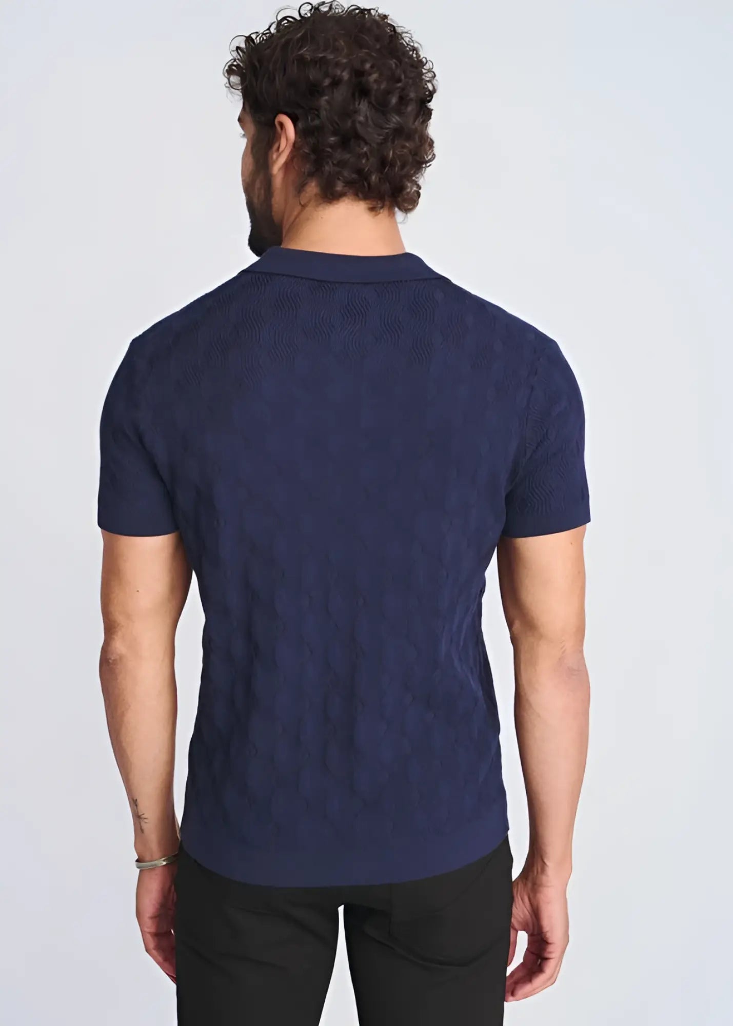 Navy blue cable-knit polo shirt made of silk and tencel featuring textured stripes for a stylish look