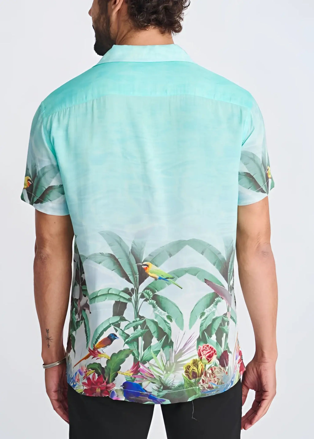 Tropics border print short-sleeved modal shirt in mint green with colorful birds and foliage featuring a relaxed fit