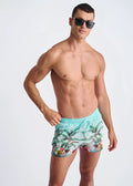 Men’s turquoise tropics print swim shorts with tropical palm tree and fruit design and mesh lining for beachwear