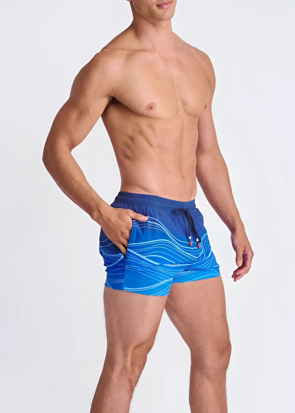 Blue swim shorts with white wavy print mesh lining and black drawstring waistband for comfortable wear