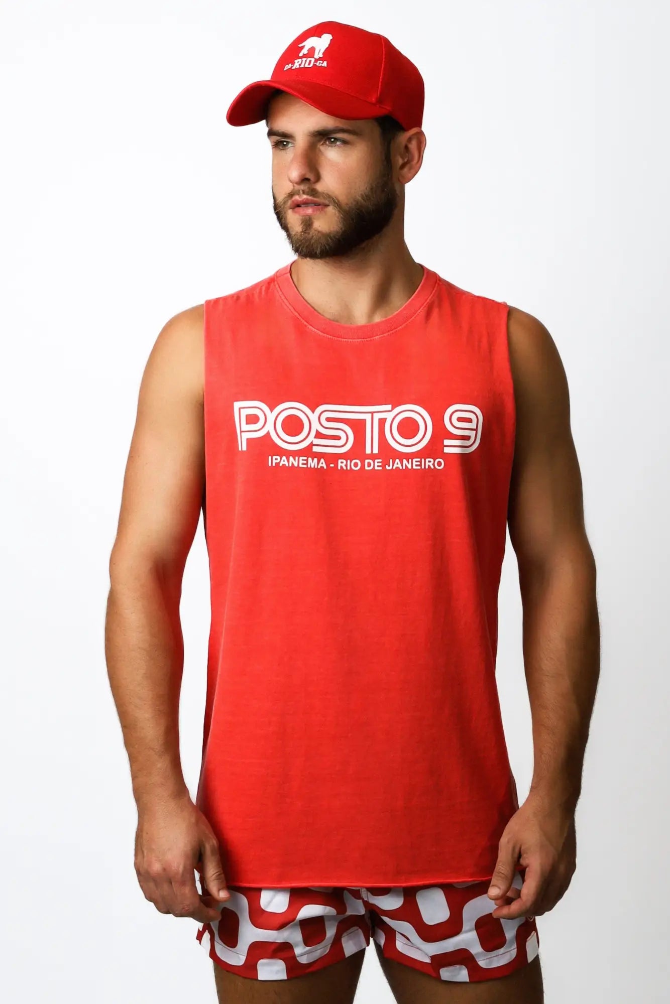 Red sleeveless tank top with white posto 9 lettering and panema rio de janeiro text on chest for men