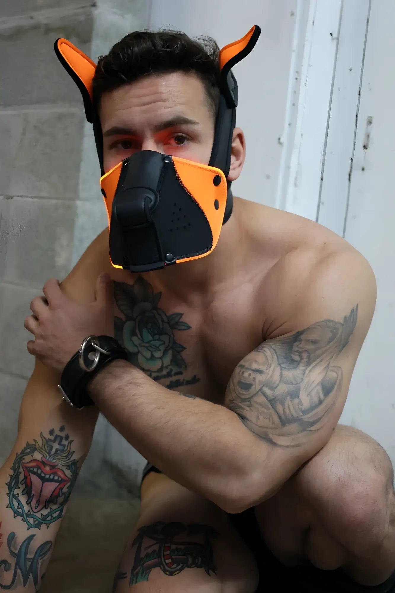 Poundtown pup mask 2.0 neon orange dog mask with ear-like protrusions in bright orange and black colors