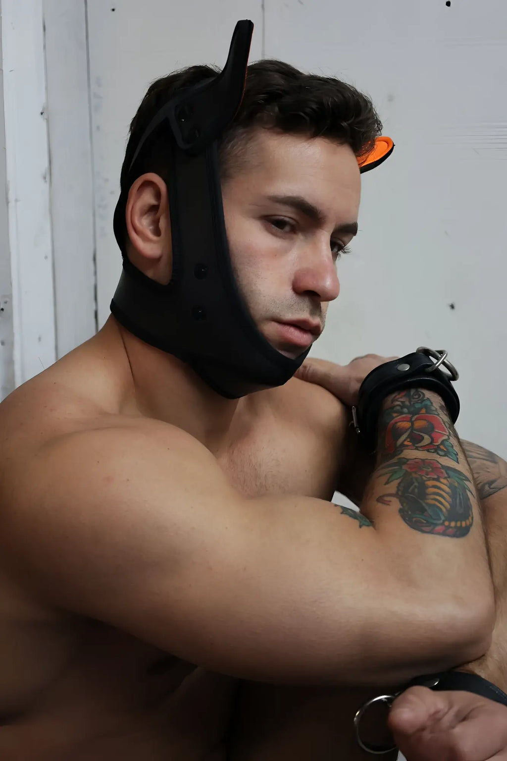 Black leather poundtown pup mask 2.0 with neon orange tipped horns for costume or play use