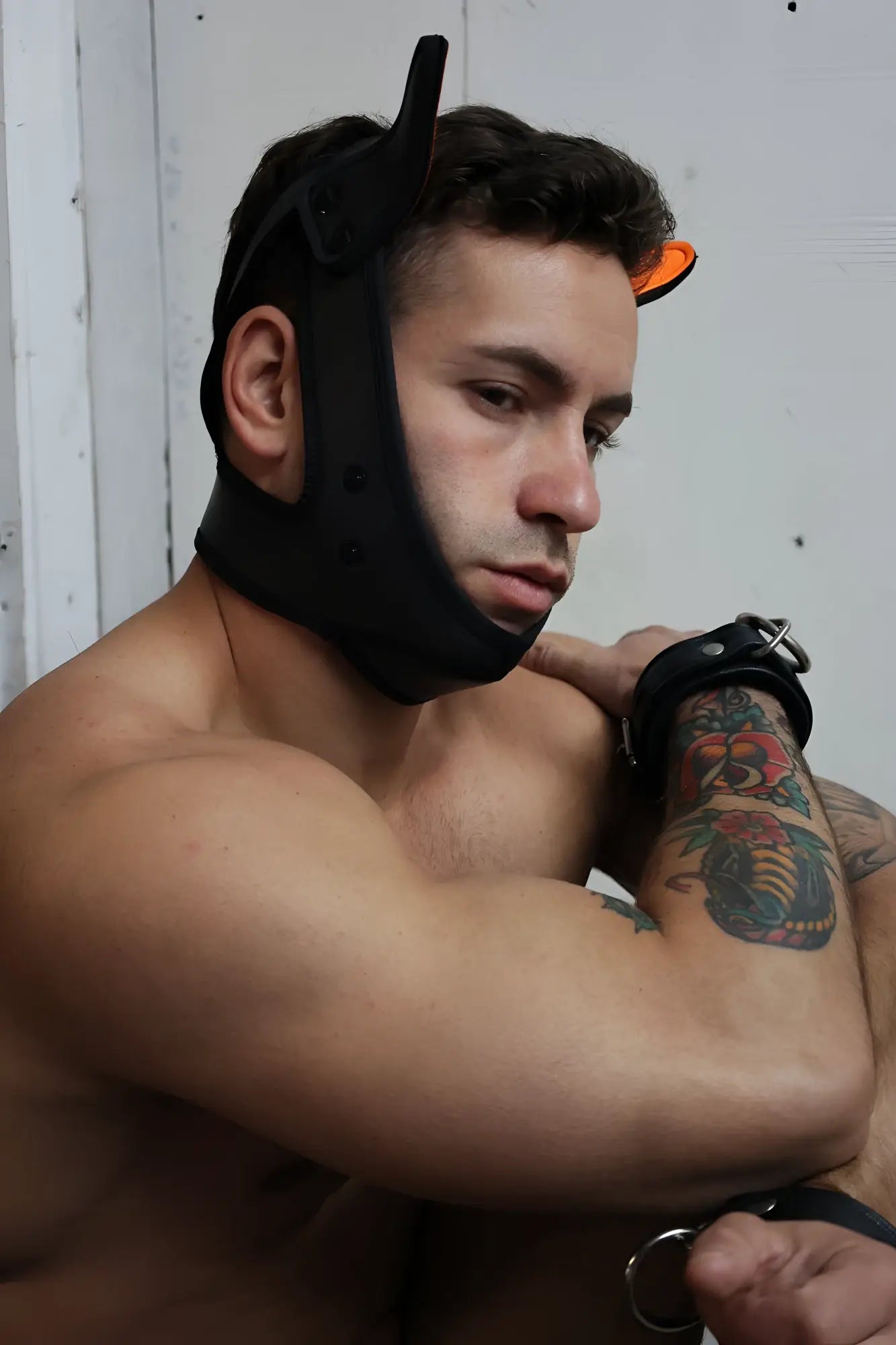 Black leather poundtown pup mask 2.0 with neon orange tipped horns for costume or play use