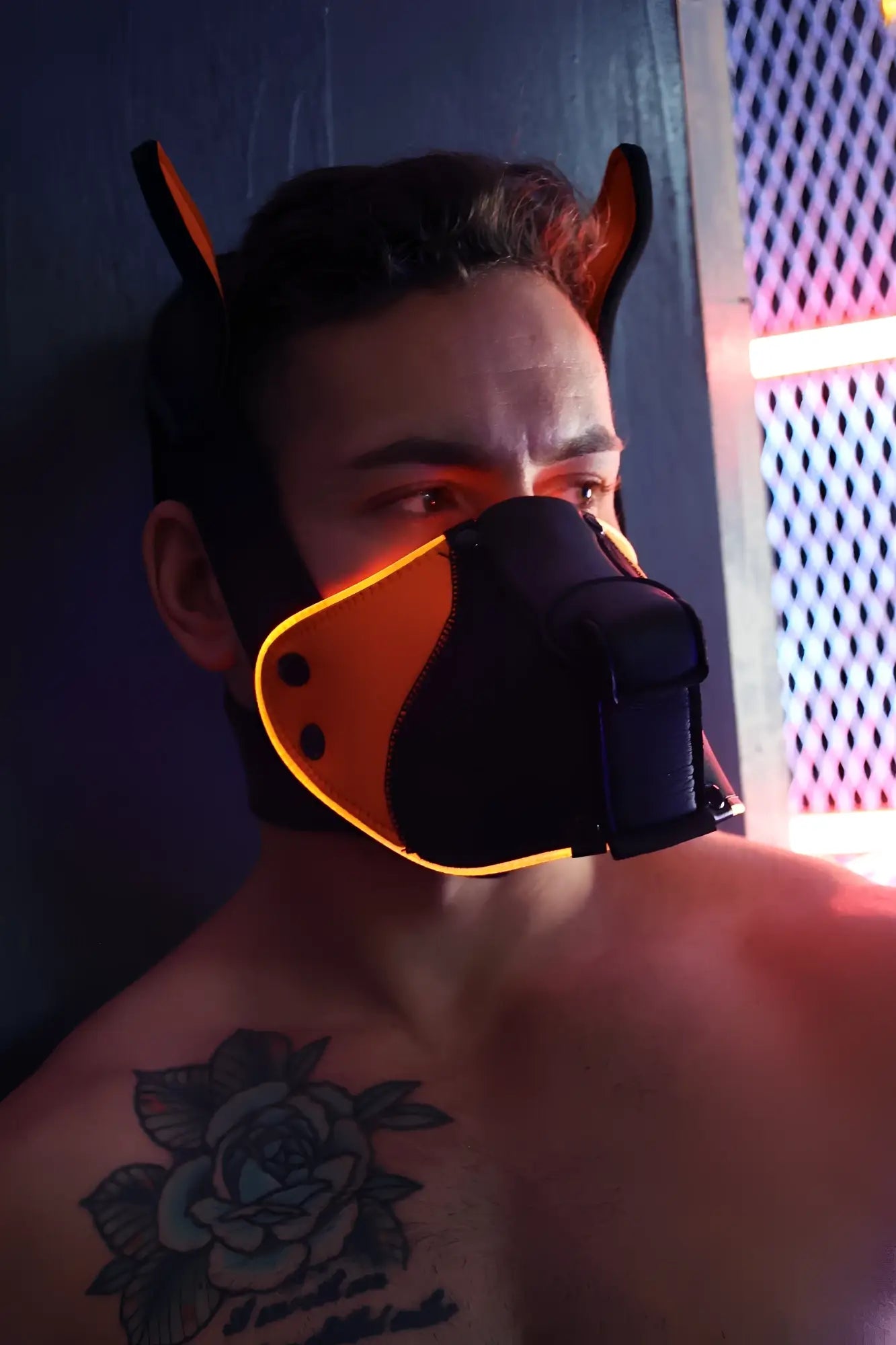 Black and orange led-lit dog mask with ear-like protrusions poundtown pup mask 2.0 neon orange for cosplay