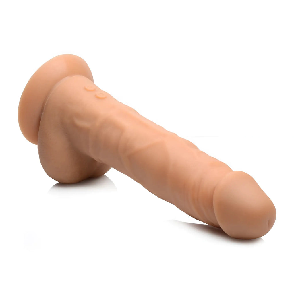 Beige silicone power pounder auto-thrusting dildo with realistic textured surface and rounded head