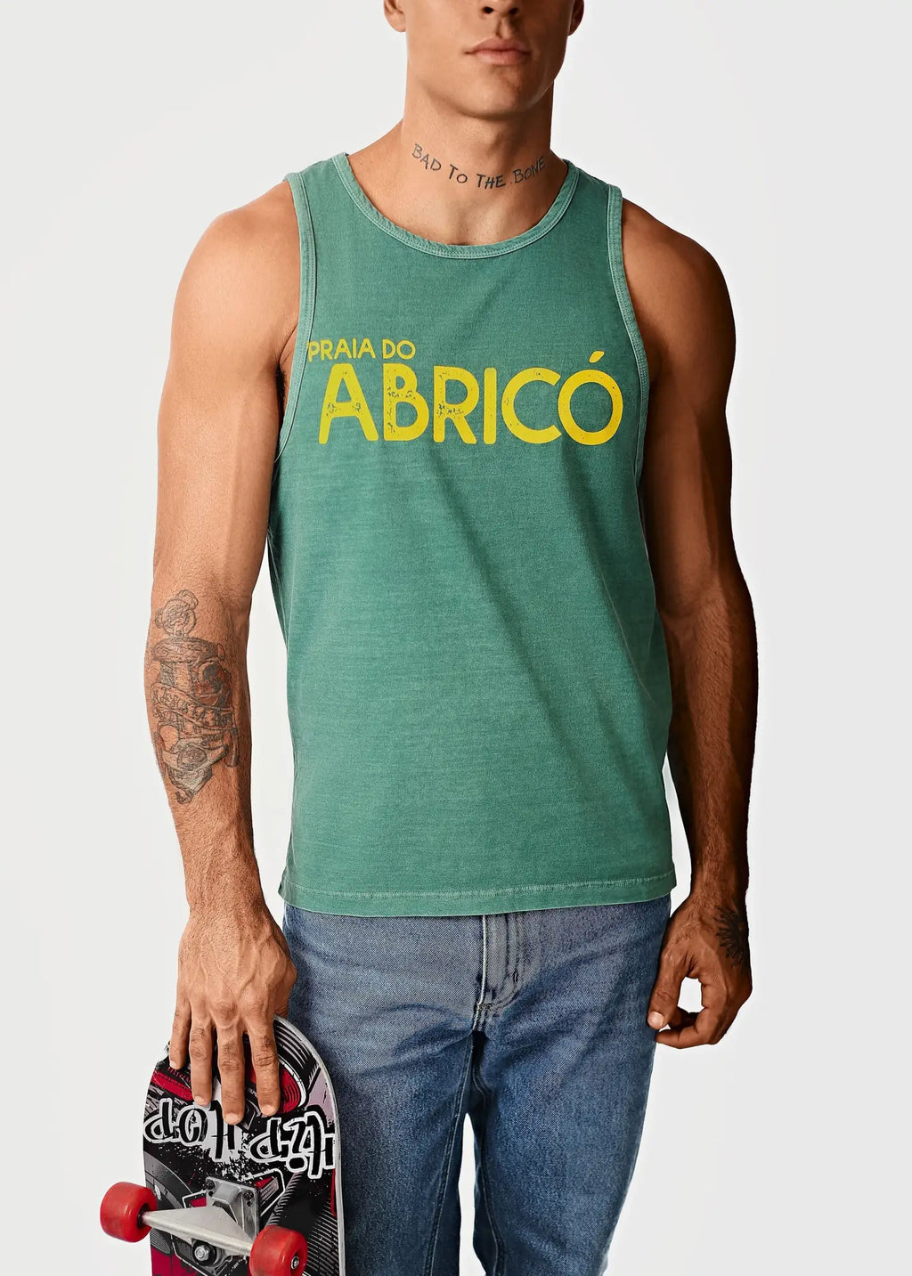 Green men’s tank top with bold yellow praia do abricó lettering across the chest, rio famous nude beach design