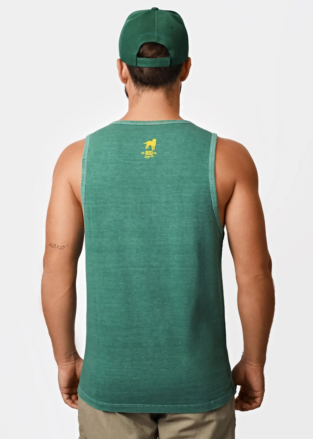 Back view of praia do abrico mens green sleeveless tank top with small yellow logo for rio famous nude beach