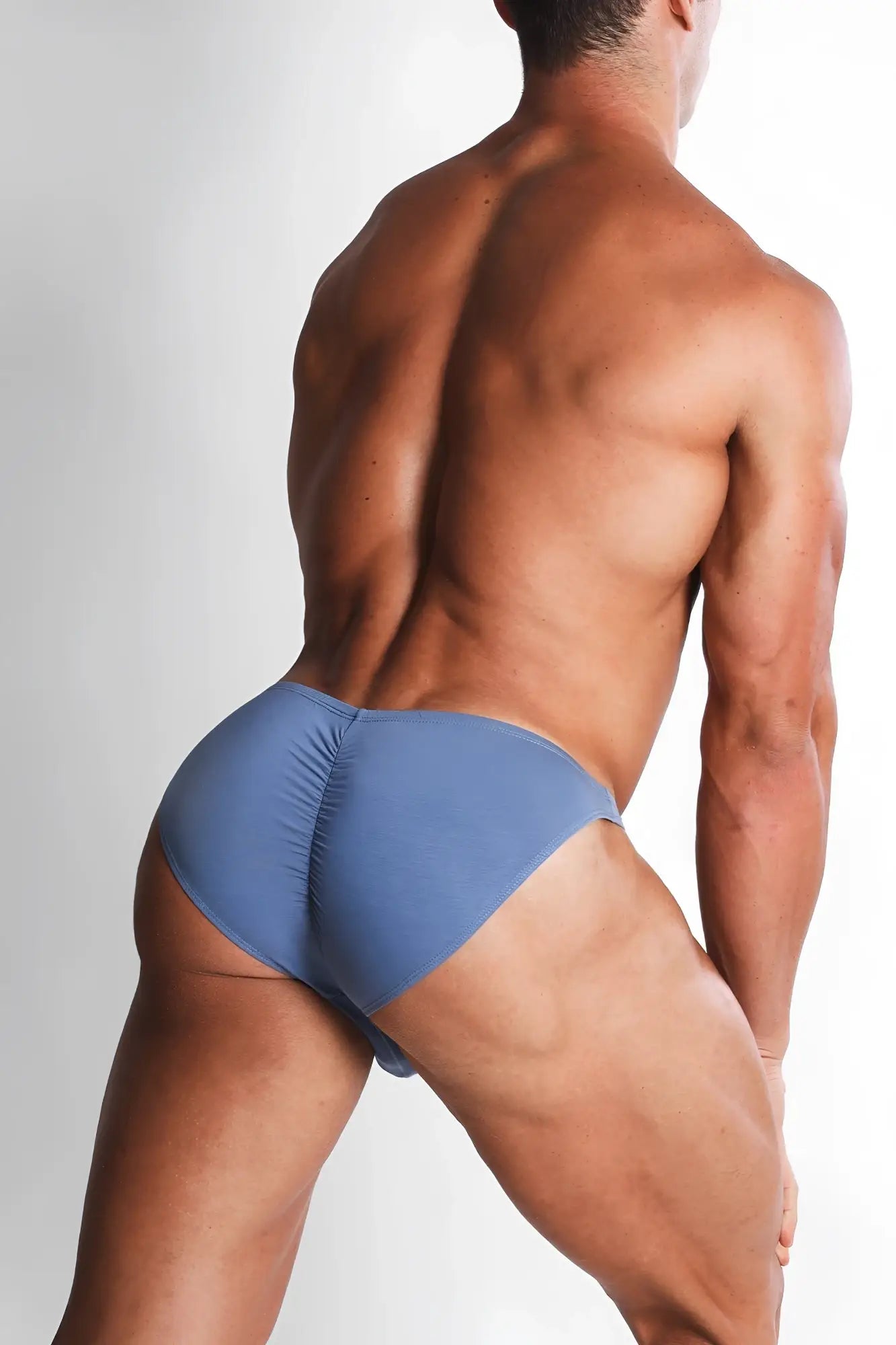 Blue premium modal athletic briefs with ruched back design shown from the back in periwinkle blue color