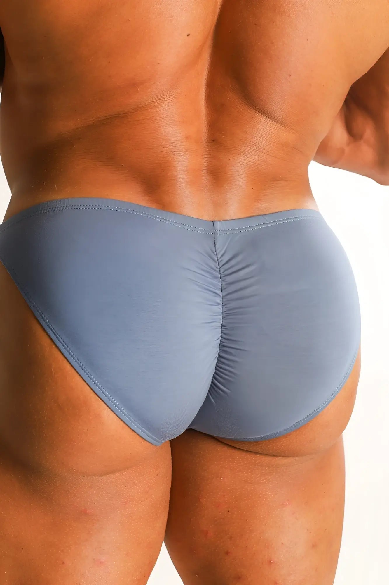 Light blue premium modal scrunch-back briefs in periwinkle blue with a ruched back design shown from the back side