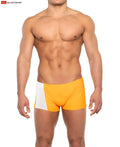 Priapos sq-cut swim trunks in bright orange and white two-tone with a sleek modern design and c-ring detail