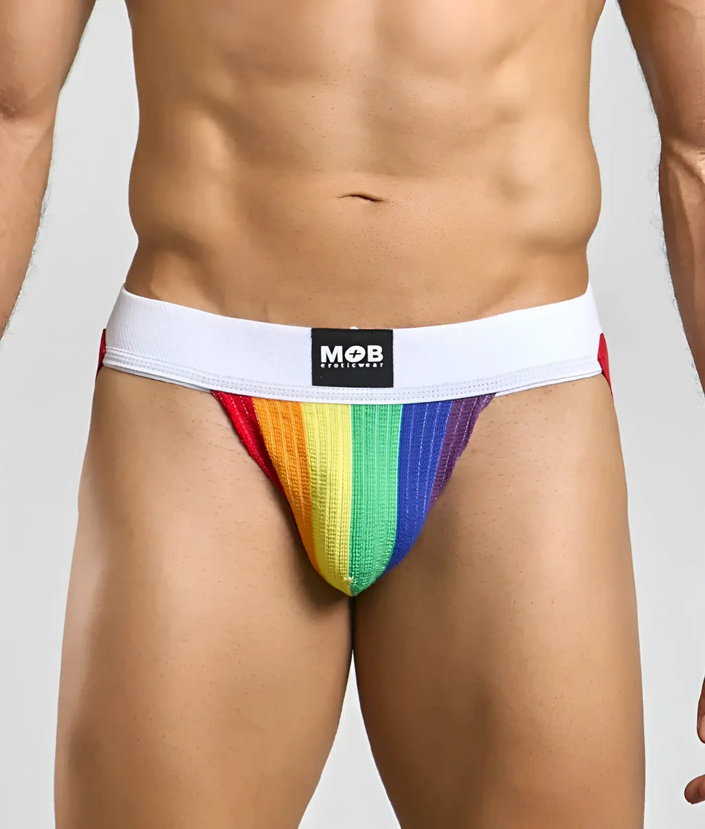 Pride flag colors jockstrap in rainbow stripes with white elastic waistband featuring mob brand logo
