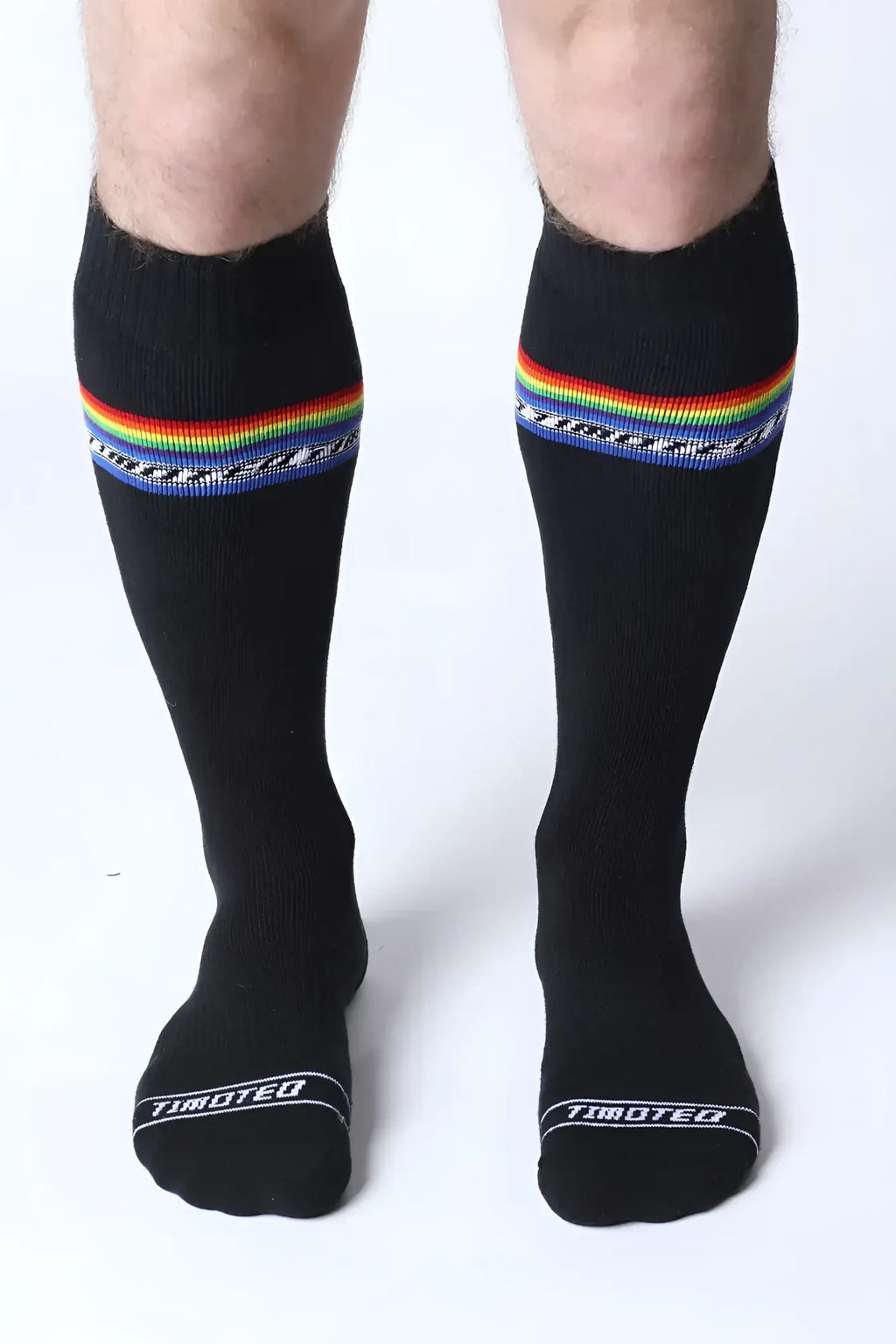 Black pride knee high socks with rainbow stripe and tiboteo branding made from comfortable stretch fabric