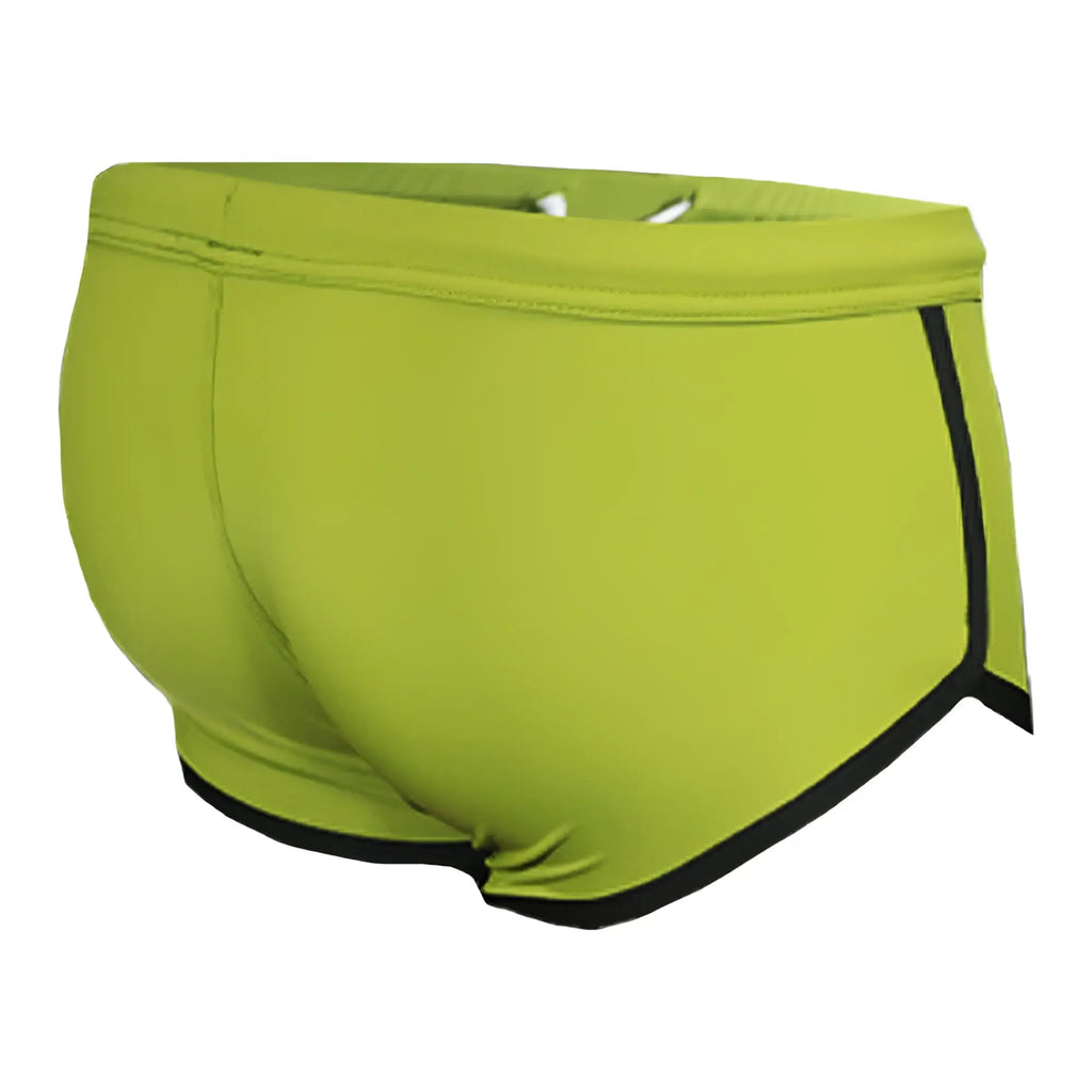 Bright lime green Pride Vince swim trunks with black trim along waistband and leg openings for swimming