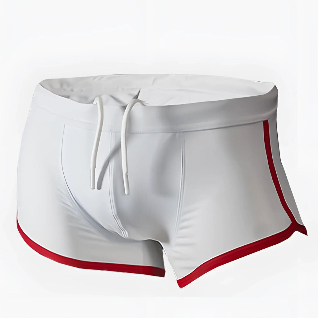 White pride vince swim trunks with red trim and drawstring waistband for comfortable beach wear