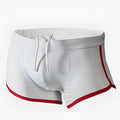 White pride vince swim trunks with red trim and drawstring waistband for comfortable beach wear