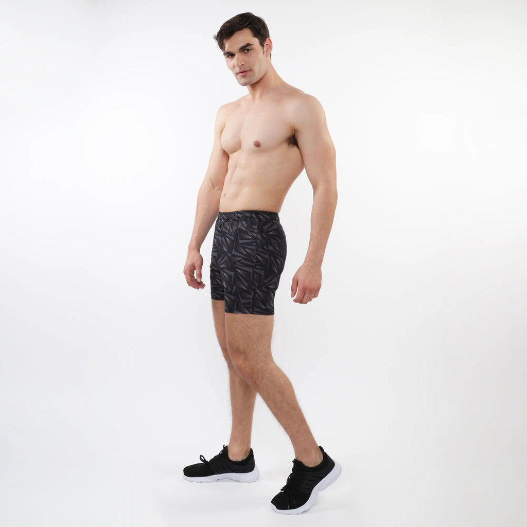 Black printed mesh stretch performance athletic shorts with geometric pattern designed for active wear