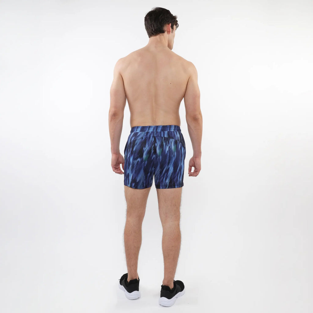 Blue abstract patterned printed mesh stretch performance athletic shorts with fitted waistband for active wear
