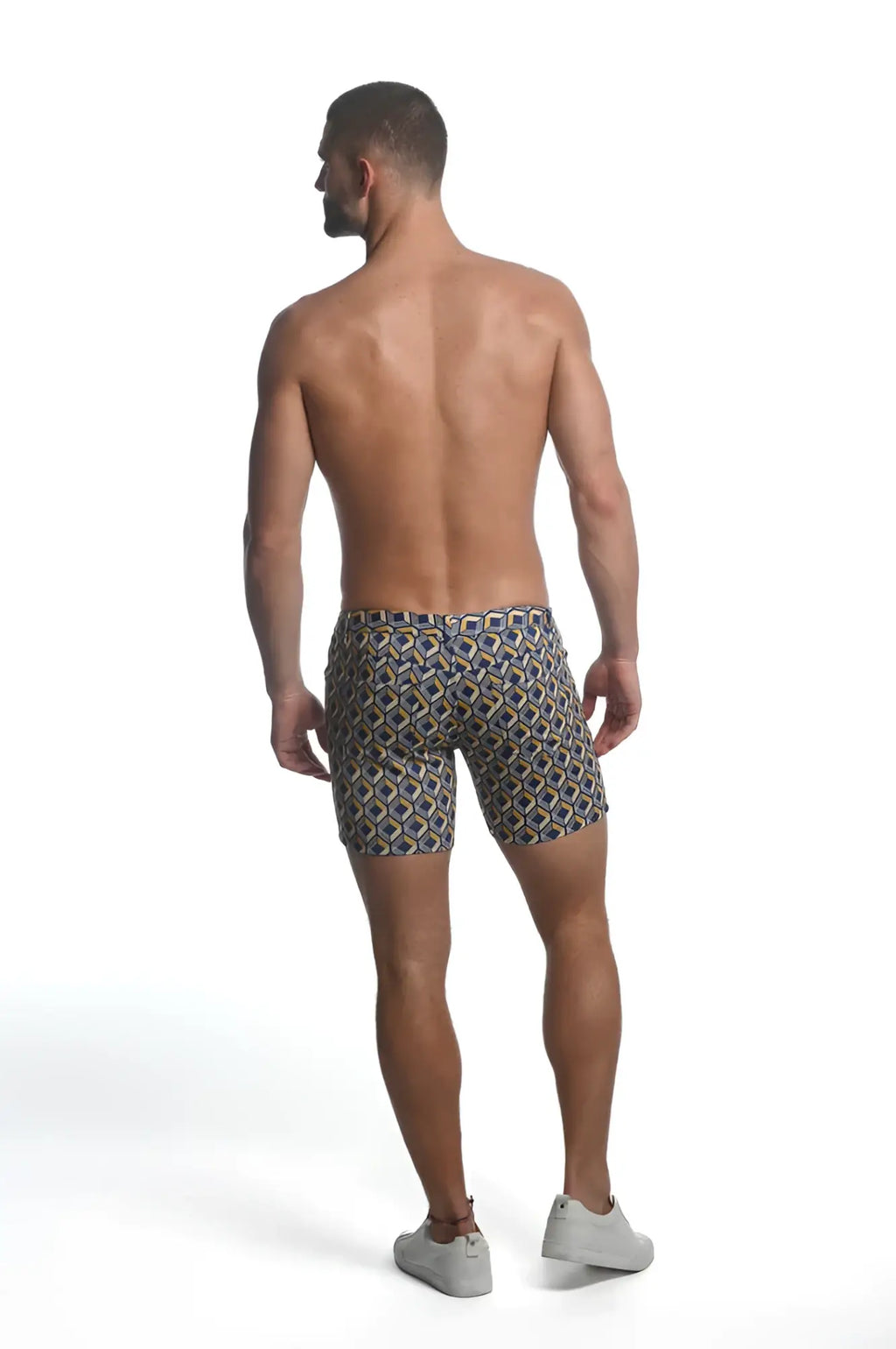 Men’s printed stretch knit short swim trunks with navy beige and gold geometric pattern in lightweight fabric