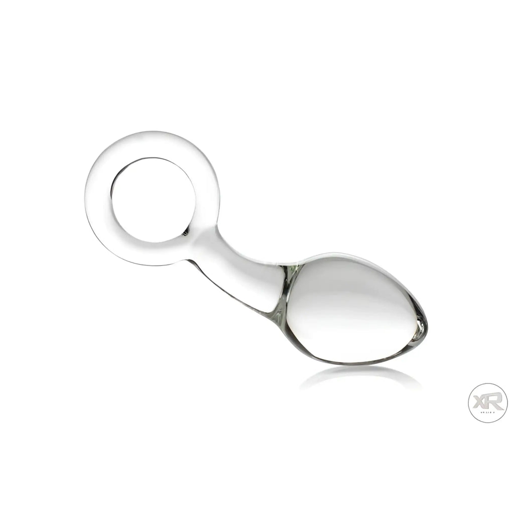 Prisms Erotic Glass Devi Big Plug: A clear, smooth, teardrop-shaped glass anal plug with a circular base handle.