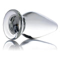 Prisms Erotic Glass Ember weighted tapered anal plug in clear glass with a wide base, set against a white background.