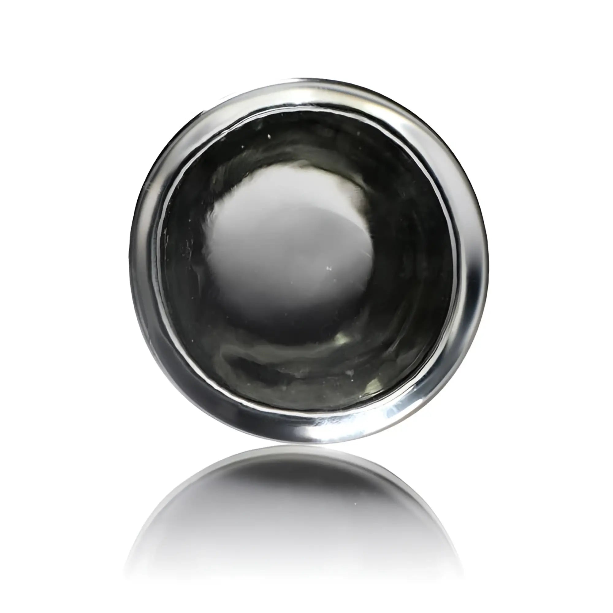 Top-down view of a clear, cylindrical Prisms Erotic Glass Pillar with a smooth, polished glass surface.